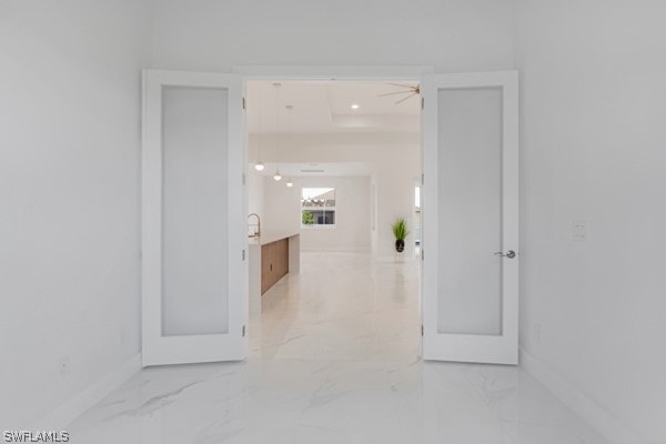 corridor featuring tile patterned floors