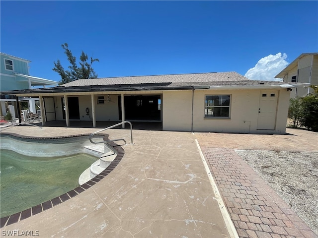 back of house featuring a patio area