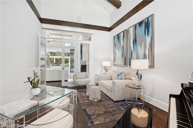 living room featuring vaulted ceiling with beams, dark hardwood / wood-style flooring, and french doors