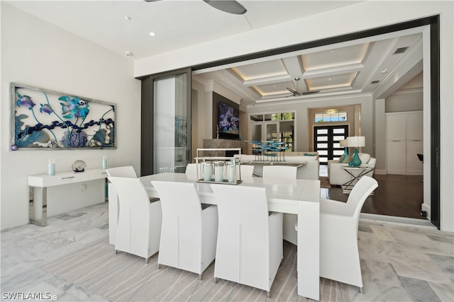 dining area with ornamental molding, coffered ceiling, and beam ceiling