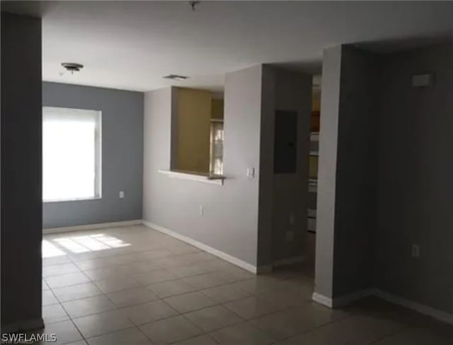 view of tiled spare room