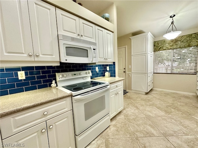 kitchen with light tile patterned floors, backsplash, white appliances, white cabinets, and pendant lighting