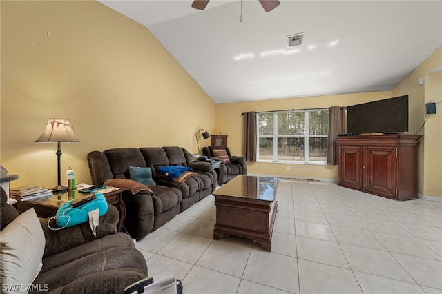 tiled living room with ceiling fan and vaulted ceiling