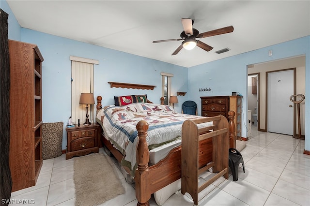 tiled bedroom with ceiling fan