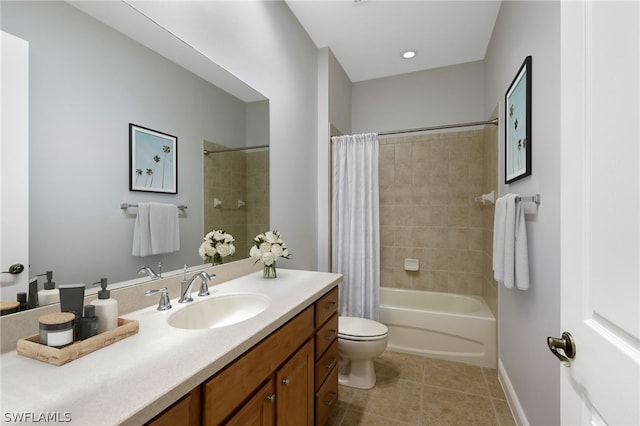 full bathroom featuring tile patterned floors, vanity, shower / tub combo, and toilet