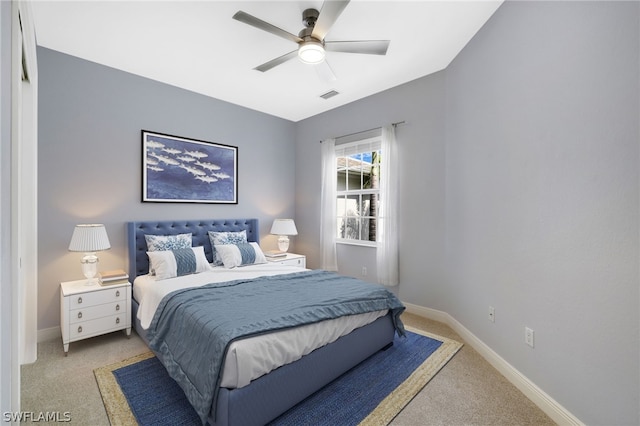 carpeted bedroom featuring ceiling fan