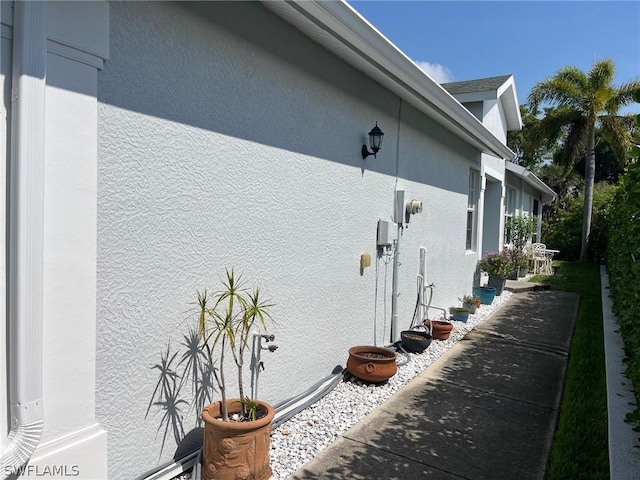 2480 Lake Ave, Naples, FL 34112 - view of property exterior featuring stucco siding