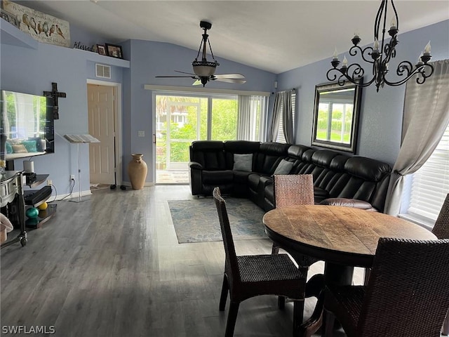 2480 Lake Ave, Naples, FL 34112 - dining space with vaulted ceiling, a chandelier, ceiling fan, wood finished floors, and baseboards