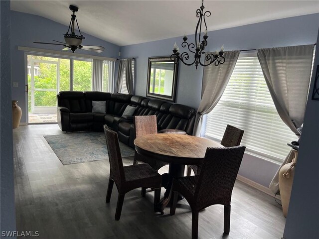 2480 Lake Ave, Naples, FL 34112 - dining space featuring a chandelier, light wood-type flooring, lofted ceiling, ceiling fan, and baseboards