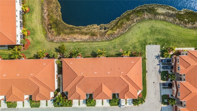 drone / aerial view featuring a water view