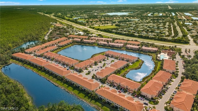 drone / aerial view featuring a water view