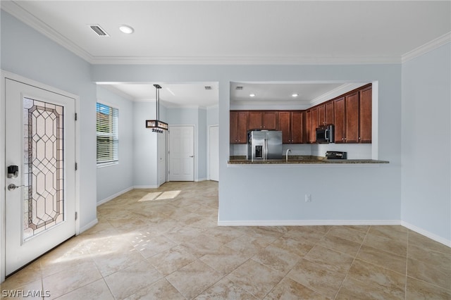 kitchen with kitchen peninsula, ornamental molding, stainless steel appliances, sink, and decorative light fixtures