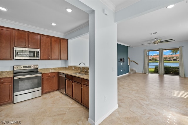 kitchen featuring crown molding, sink, ceiling fan, and appliances with stainless steel finishes