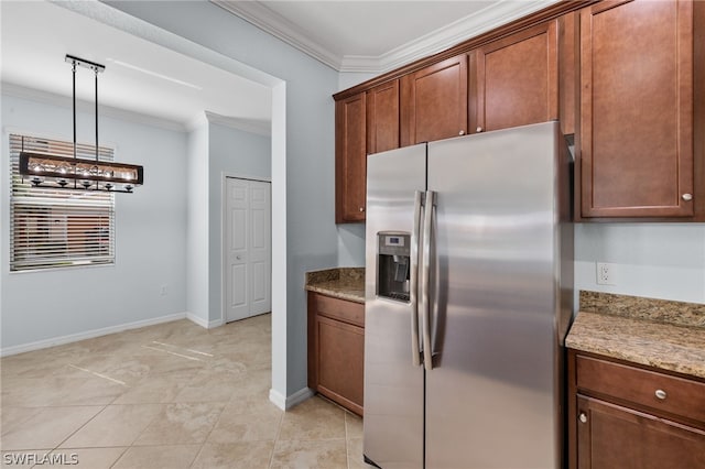 kitchen featuring crown molding, pendant lighting, stone counters, stainless steel fridge with ice dispenser, and light tile patterned flooring