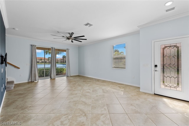 tiled entrance foyer with a water view, crown molding, and ceiling fan