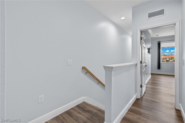 hall featuring dark wood-type flooring