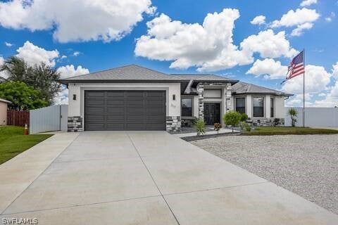 prairie-style home with a garage