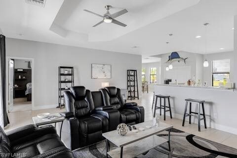 living room with ceiling fan