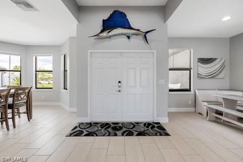 foyer entrance featuring light hardwood / wood-style flooring