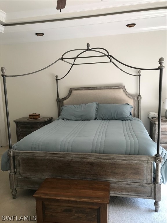 bedroom featuring carpet flooring and crown molding