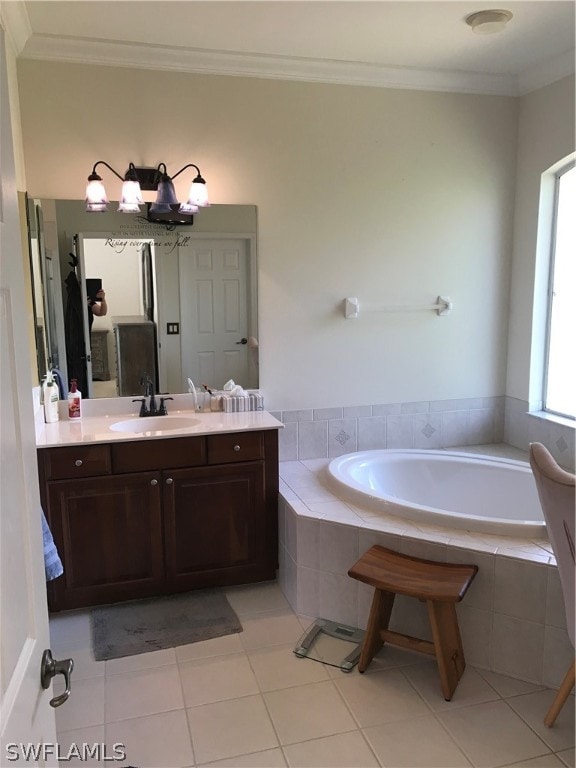 bathroom featuring crown molding, tile flooring, a relaxing tiled bath, and vanity