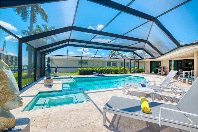 view of pool featuring a lanai and a patio area