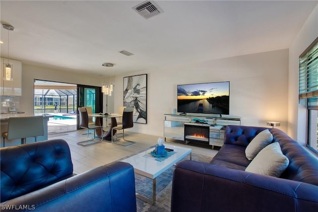 living room with light hardwood / wood-style flooring