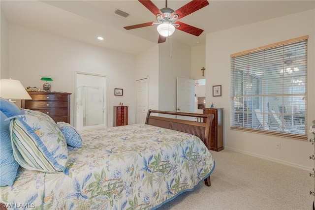 carpeted bedroom featuring ceiling fan