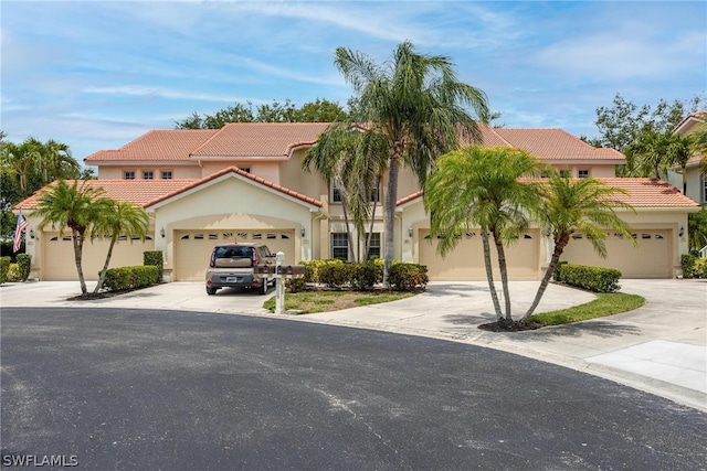 mediterranean / spanish-style house featuring a garage