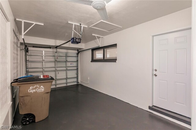 garage featuring a garage door opener