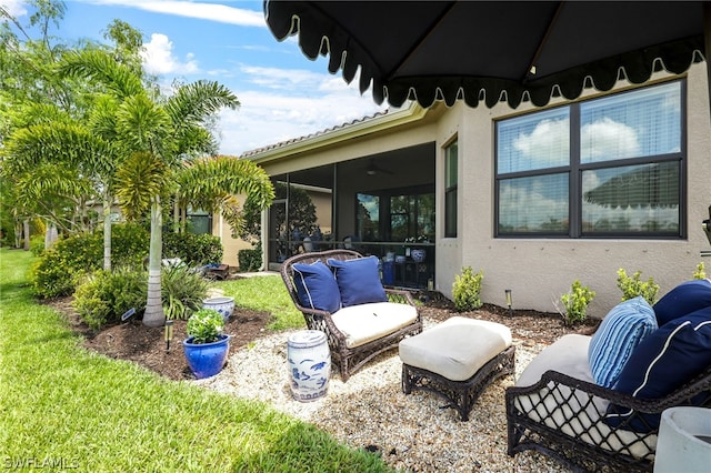 11643 Meadowrun Cir, Fort Myers, FL 33913 - view of patio featuring a sunroom and a ceiling fan