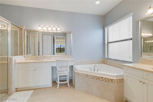 11643 Meadowrun Cir, Fort Myers, FL 33913 - full bathroom with a shower stall, a garden tub, two vanities, tile patterned flooring, and wallpapered walls