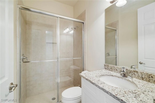 11643 Meadowrun Cir, Fort Myers, FL 33913 - full bath featuring vanity, toilet, and a stall shower