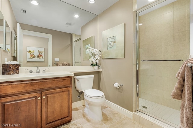 bathroom with an enclosed shower, tile flooring, vanity, and toilet