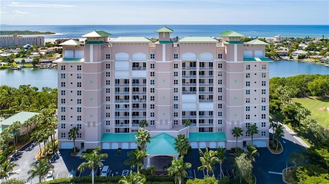 view of building exterior with a water view