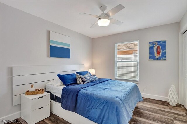 bedroom featuring hardwood / wood-style floors and ceiling fan