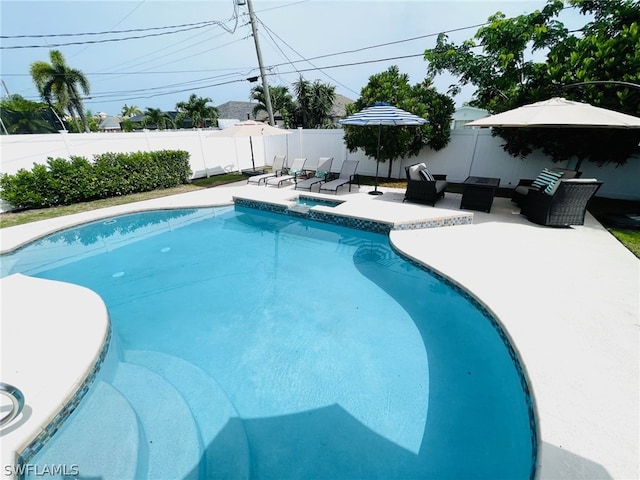 view of pool featuring an outdoor hangout area and a patio