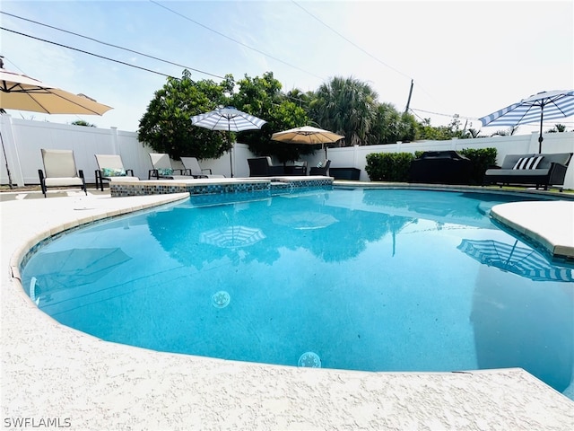 view of pool with a patio