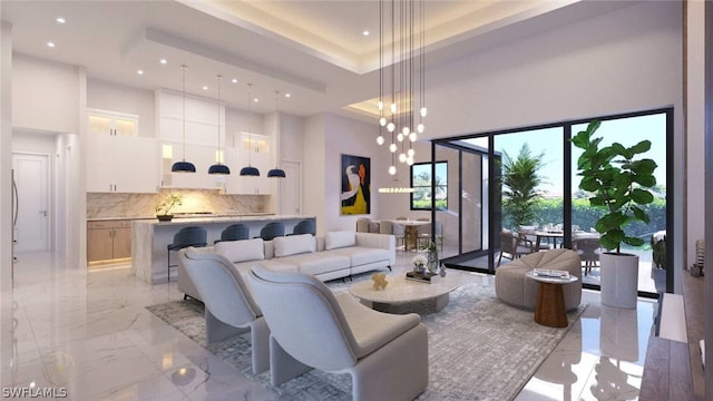 living room with a high ceiling