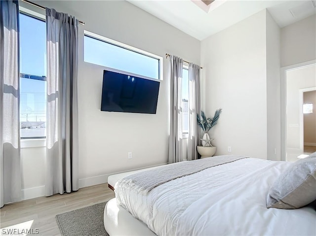 bedroom featuring light wood-type flooring