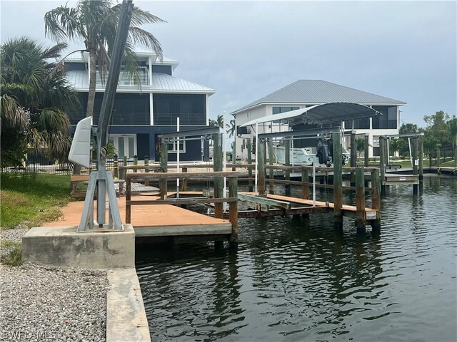 dock area with a water view