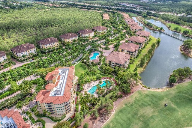 drone / aerial view with a water view