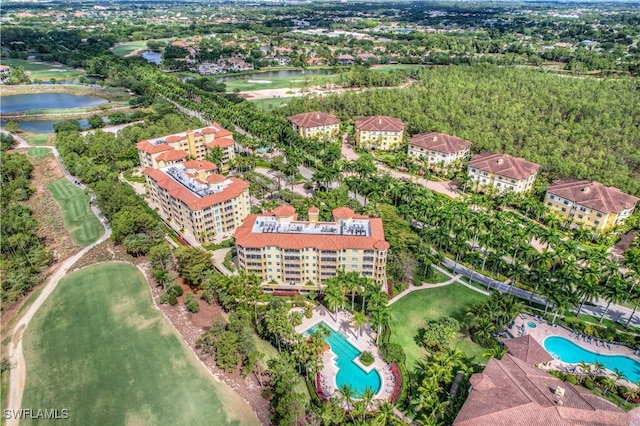 bird's eye view with a water view