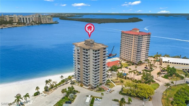 drone / aerial view with a view of the beach and a water view