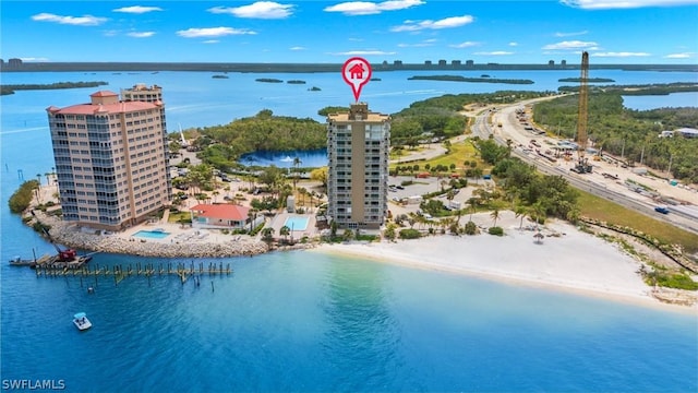 birds eye view of property featuring a water view