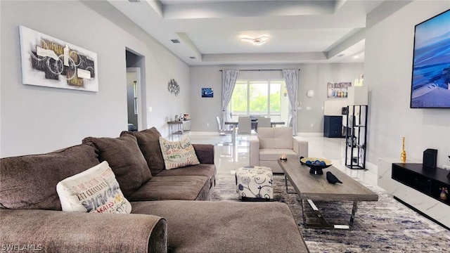 living room with a raised ceiling