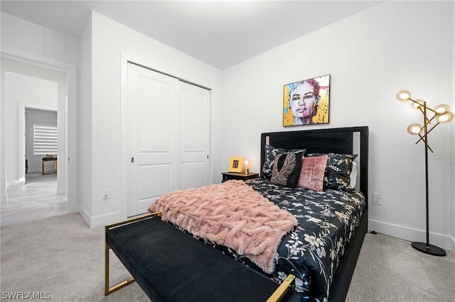 carpeted bedroom featuring a closet