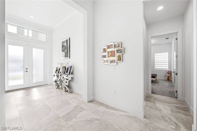 entryway featuring french doors