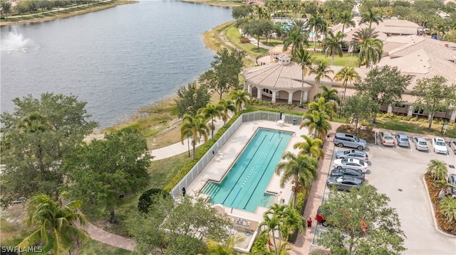 drone / aerial view with a water view