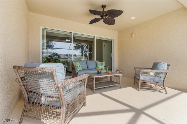 view of patio featuring an outdoor hangout area and a ceiling fan